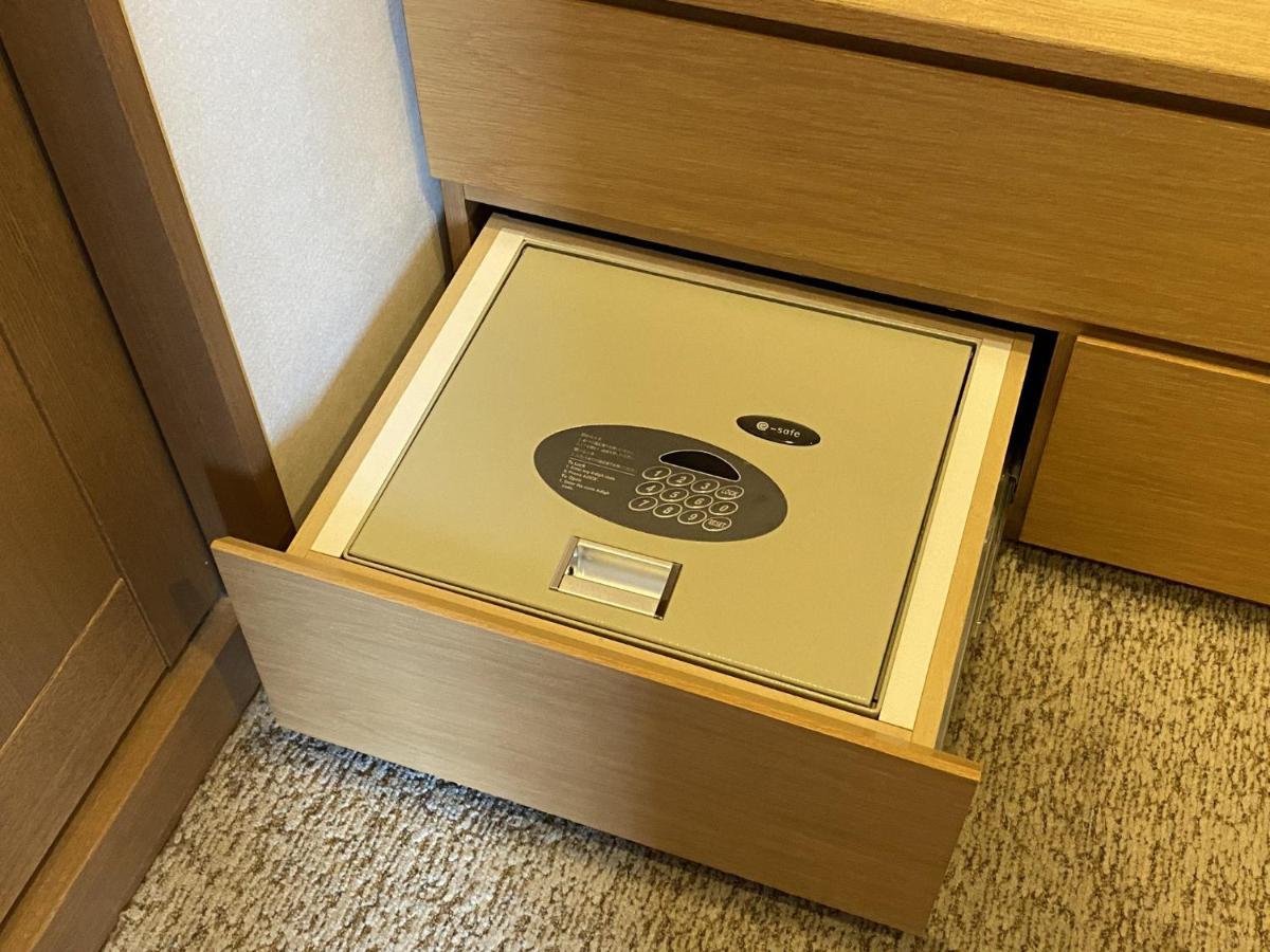 Hotel Associa Shizuoka Eksteriør billede A safe in a drawer