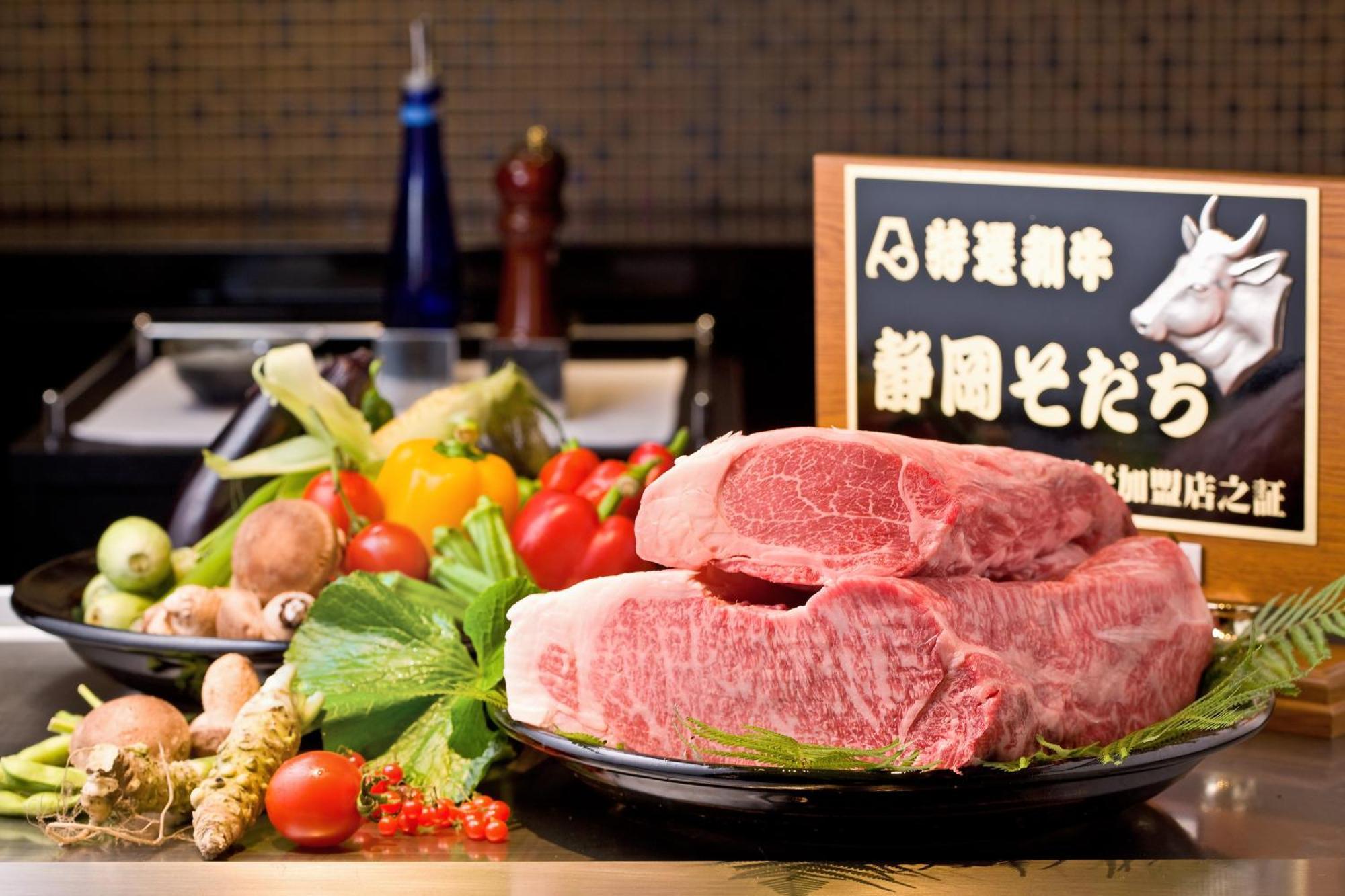 Hotel Associa Shizuoka Eksteriør billede A Japanese restaurant with a sign advertising the use of horse meat
